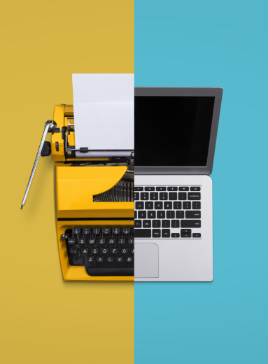 A typewriter and a macbook